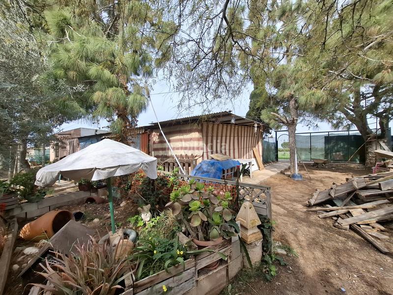 Foto aa6135c7-0ba6-4e5b-bae2-648c91ae5251. Masia amb xemeneia aparcament a El Edén Guardamar del Segura