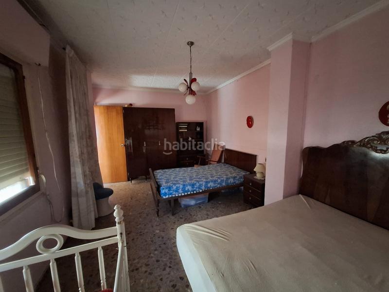 Foto c9f9bbed-66a2-4fb0-a9c1-451eb9c2ea52. Casa adossada amb xemeneia aparcament a Dolores