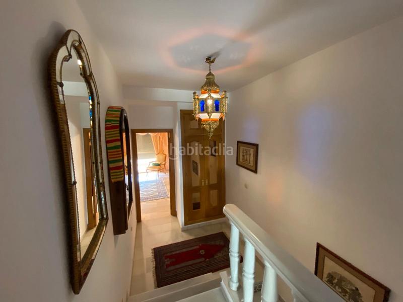 Foto f5dd11ac-a7dc-436e-b1f5-32301fb0c320. Casa a schiera con camino riscaldamento parcheggio piscina in Benalmádena