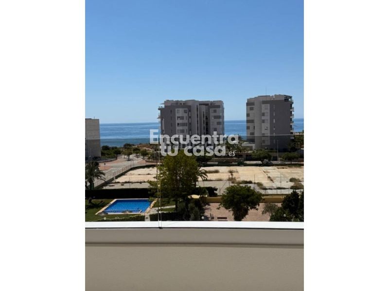 Foto e0e5a9bf-ee21-498d-ace1-589c70ba95cb. Ático  dúplex con solárium, vistas al mar y piscina en villajoyosa. en Vila Joiosa (la)