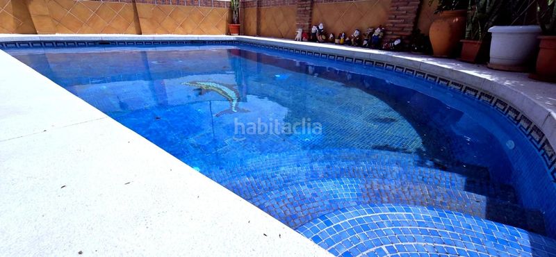 Foto 7147f8e0-ad88-4ada-82b5-a2c7c0cc3288. Casa bifamiliare con riscaldamento parcheggio piscina in Málaga