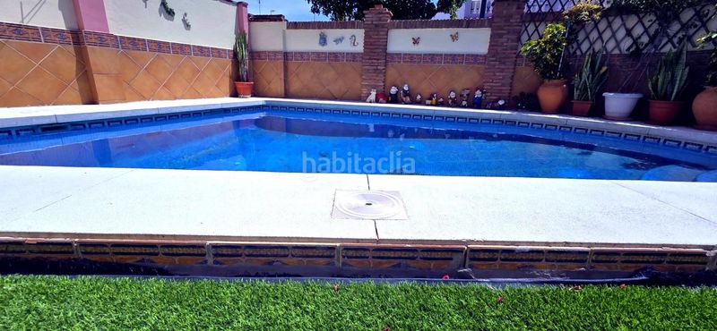Foto f5b3a4f2-d6bf-4e32-b737-07b9e037ead9. Casa bifamiliare con riscaldamento parcheggio piscina in Málaga