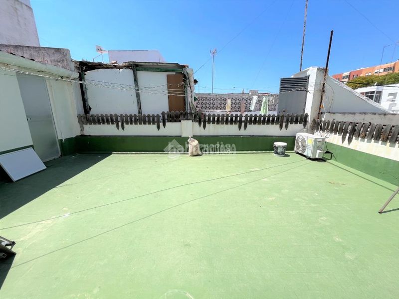 Foto c7bf2bfb-5d98-442e-a7ca-e986aa60ba6d. Casa aparellada a Camposoto - Gallineras San Fernando