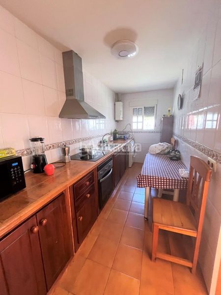 Foto ddc2810d-56da-4fd6-8e71-ed4e00ca5ccf. Casa aparellada a Camposoto - Gallineras San Fernando