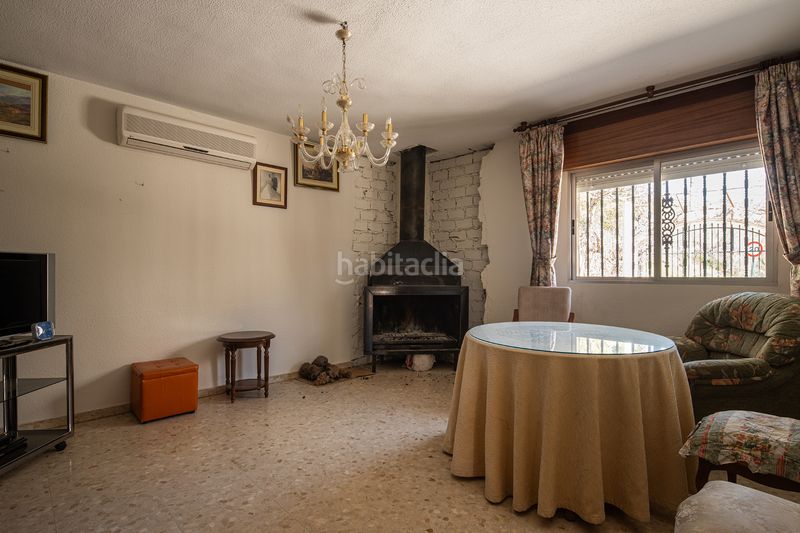 Foto 2b939a71-1729-4873-82ec-650541139401. Casa aparellada amb xemeneia aparcament a Lancha del Genil Granada