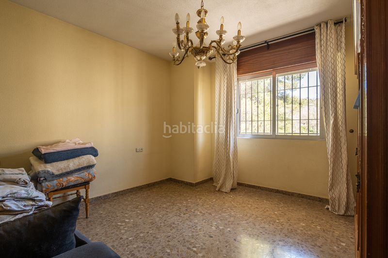 Foto 4237df07-35d7-47fa-a925-4393fb6216af. Casa aparellada amb xemeneia aparcament a Lancha del Genil Granada