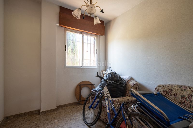 Foto 557b6f97-9352-44fb-a428-8fc624d78b39. Casa aparellada amb xemeneia aparcament a Lancha del Genil Granada