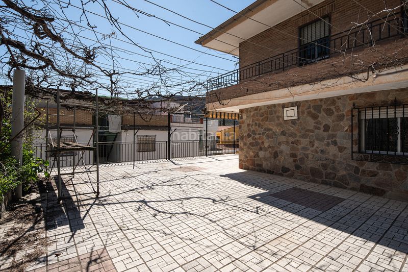 Foto c4672b6d-f953-4667-b977-c36cefd8cc7d. Casa aparellada amb xemeneia aparcament a Lancha del Genil Granada