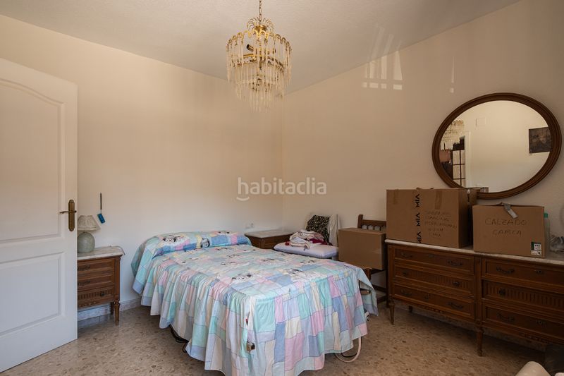 Foto f0b44384-7000-45b9-aa75-d9162f705122. Casa aparellada amb xemeneia aparcament a Lancha del Genil Granada