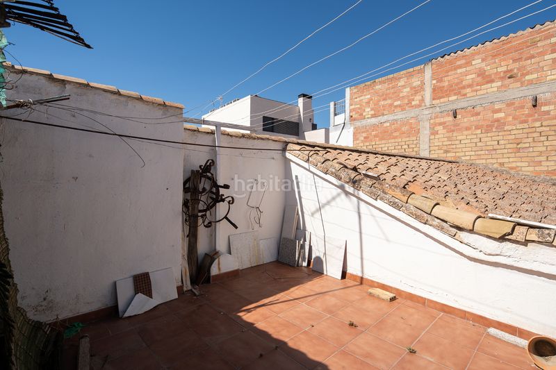 Foto c154e96c-9e3d-48fb-86a6-d60227658750. Casa adossada amb aparcament a Maracena