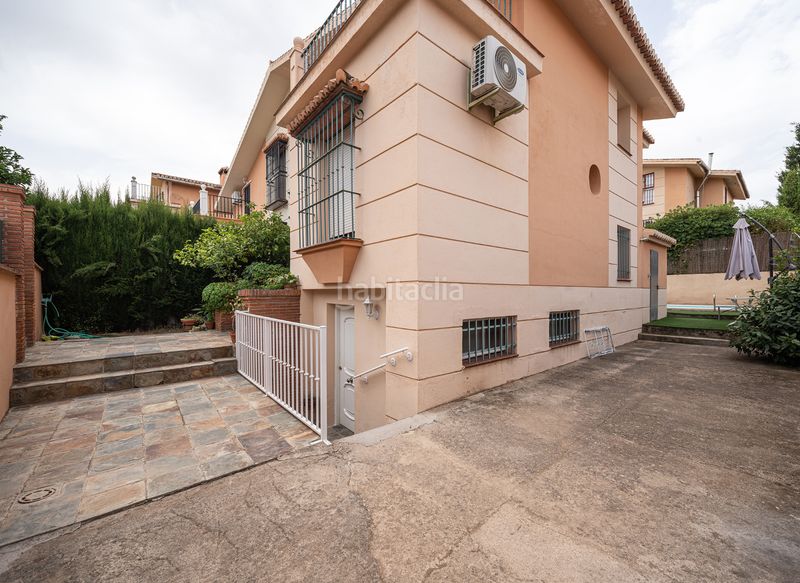 Foto b595f39f-693b-4072-9325-63644f10eed8. Maison jumelée avec cheminée parking piscine dans Huétor Vega