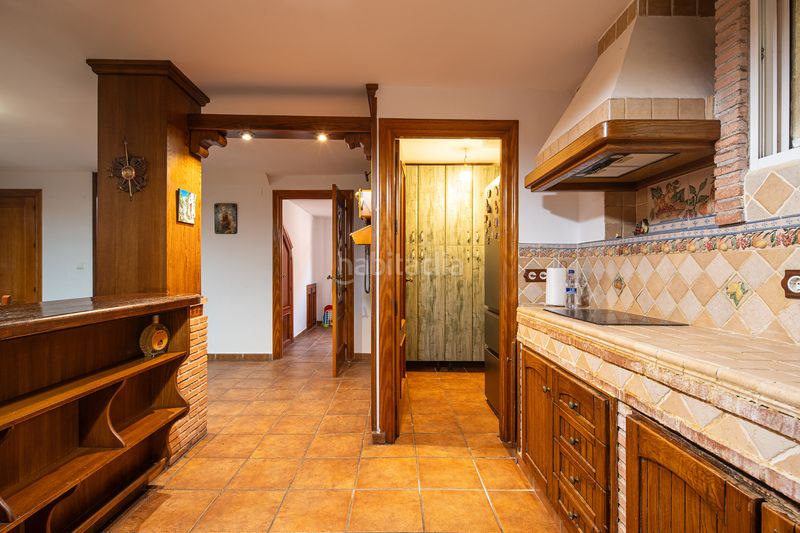 Foto c166dbc3-d7b6-462e-b701-a54380eff5ec. Maison jumelée avec cheminée parking piscine dans Huétor Vega
