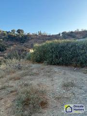 Finca rústica  N/a. Terreno con casas prefabricadas y servicios en monda – posibilid