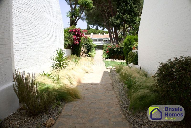 Foto 7347830d-aff3-41dd-8960-978d1b60f2b7. Planta baixa amb xemeneia piscina a Nagüeles Alto Marbella