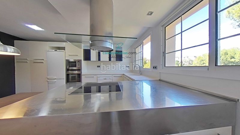 Foto e312781d-5b73-41af-9bcc-59a5c6017611. Chalet mit heizung parking pool in pla de maset - cap de Salou Salou