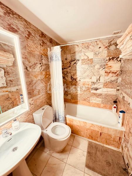Foto c6d4e598-b0ca-456c-8333-1f58bafe3fad. Casa adossada a Playa de las Américas Arona