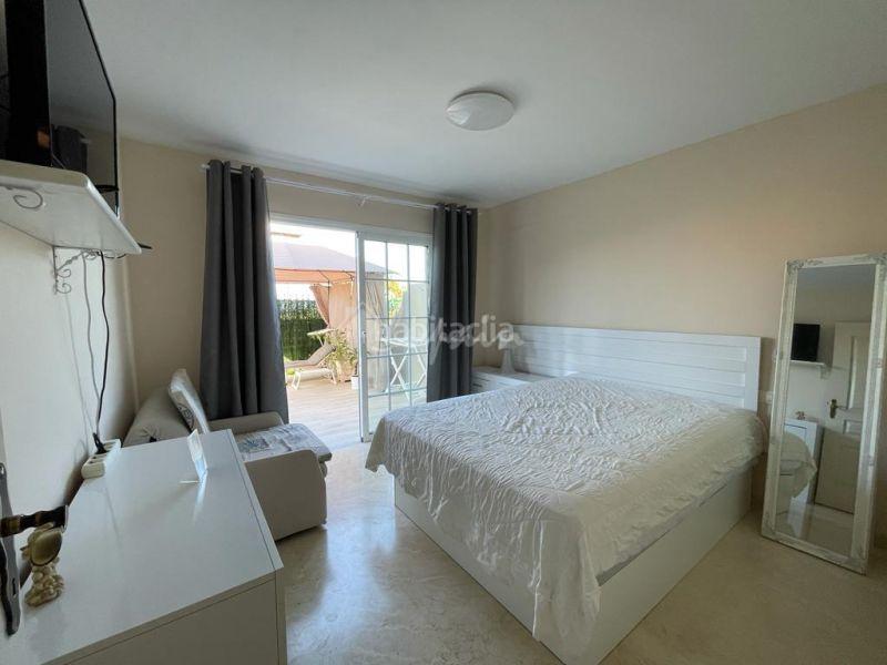 Foto 1c226821-c1b9-401d-8be9-e12da09348b7. Casa adosada en Palm - Mar Arona