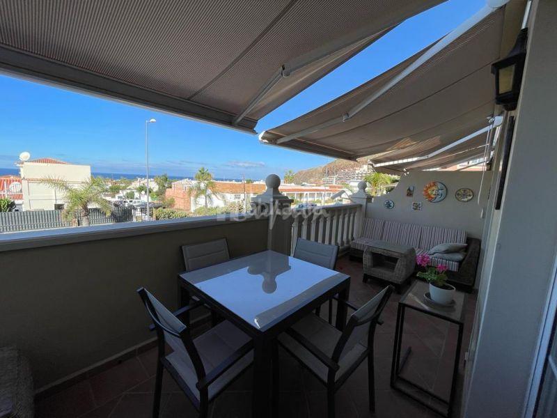 Foto e75bf6ce-c2ea-4179-b0c7-d7d13eb280f8. Casa adosada en Palm - Mar Arona