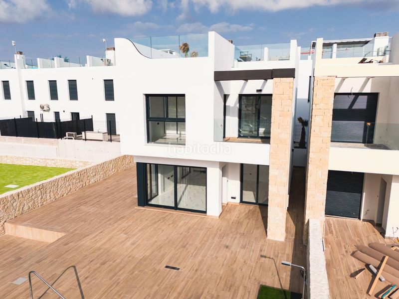 Foto dc2364e7-3b52-4ad4-bc92-671b4e2f1cc9. Chalet complejo residencial de nueva obra en punta prima en Orihuela