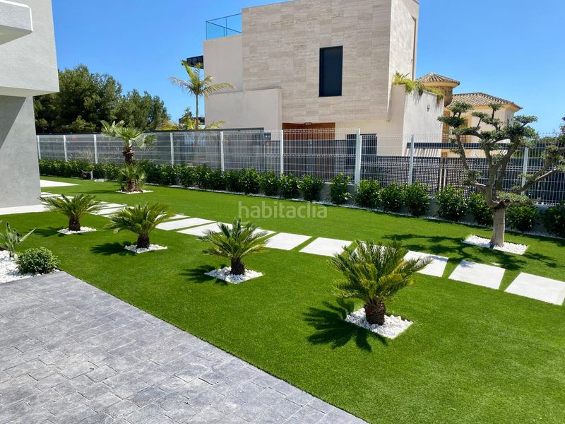 Foto c4eb5ab6-8c04-49f7-a6af-2e36514a2974. Chalet avec parking piscine dans Golf Bahía Finestrat