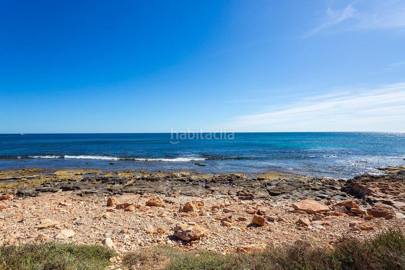 Foto 1aa34a1b-0946-4885-a460-ad59e4aacb02. Dúplex  reformado en venta en Playa de los Náufragos. en Torrevieja