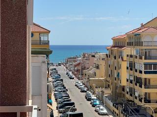 tic  Los europeos. Apartamento con vistas laterales al mar y piscina comunitaria  z