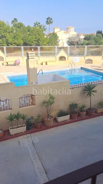 Foto 0a24244a-0e49-48c8-944d-eb0d0403fda4. Casa adossada amb aparcament piscina a Playa Flamenca Orihuela
