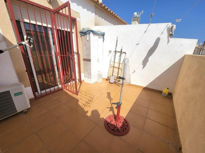 Foto 3e109eed-ec68-43d5-8874-ec6c78bfad63. Casa adossada amb aparcament piscina a Playa Flamenca Orihuela