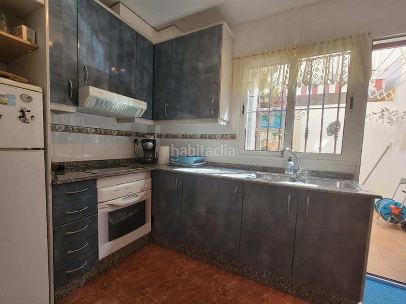Foto 5104d800-0509-40bd-b31d-29254a8b7724. Casa adossada amb aparcament piscina a Playa Flamenca Orihuela