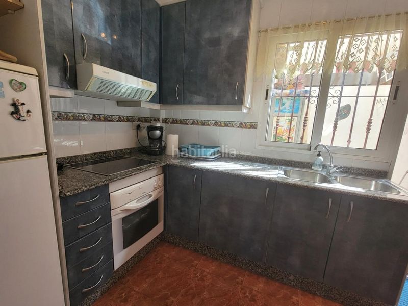 Foto 5f0f5a2f-e883-4bc5-9682-2fa8ecaa40ac. Casa adossada amb aparcament piscina a Playa Flamenca Orihuela