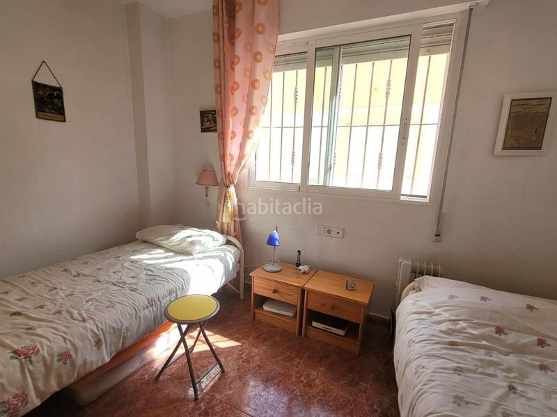Foto 69f51bba-8139-4a9d-a15e-96df0bb78ed7. Casa adossada amb aparcament piscina a Playa Flamenca Orihuela