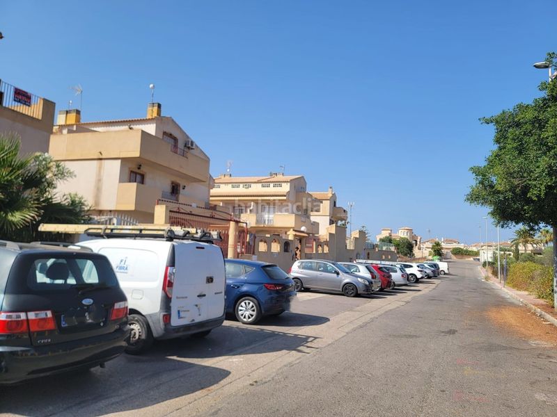 Foto 6d92db68-e052-4768-a3f7-fcadf80be38a. Casa adossada amb aparcament piscina a Playa Flamenca Orihuela