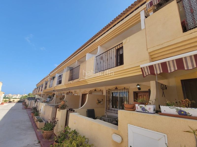 Foto 96cf158f-bea4-4614-815e-7fff70557708. Casa adossada amb aparcament piscina a Playa Flamenca Orihuela