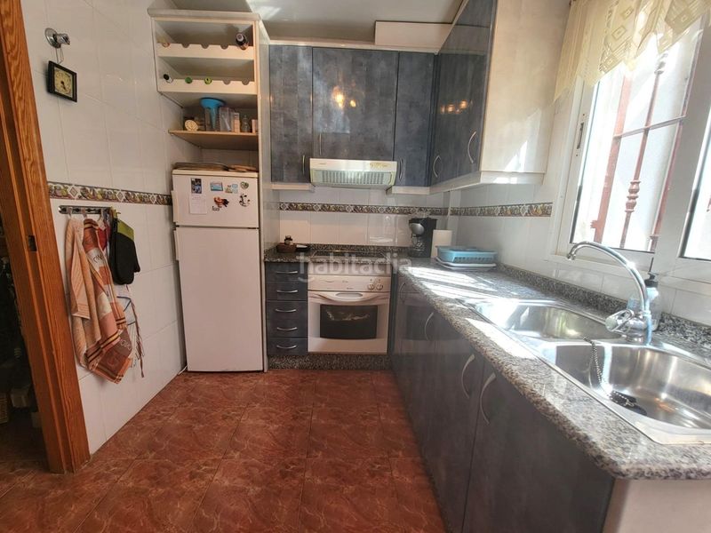 Foto e9c59e9e-f9fe-4da7-a7e9-e6072b6a5fb7. Casa adossada amb aparcament piscina a Playa Flamenca Orihuela