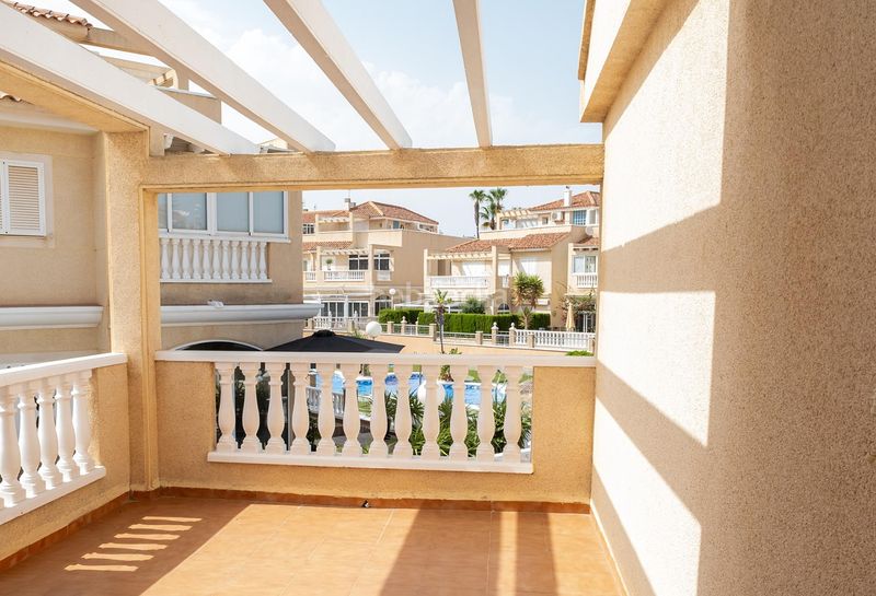 Foto 2a3e7f76-86f8-4287-89b4-eb6a89697879. Casa aparellada amb calefacció piscina a Zeniamar - Horizonte - La Campana Orihuela