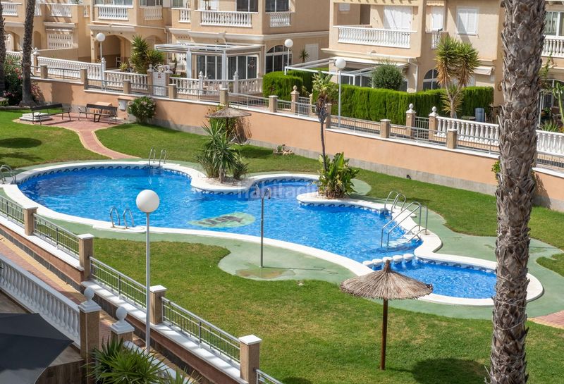 Foto 2d44c94e-7d38-47de-b352-d09f92a70cf0. Casa aparellada amb calefacció piscina a Zeniamar - Horizonte - La Campana Orihuela