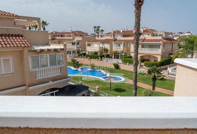 Foto b7d54f09-a68d-410b-ab6f-f9983d799e96. Casa aparellada amb calefacció piscina a Zeniamar - Horizonte - La Campana Orihuela