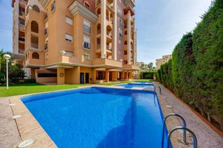 Pis a Zona Playa de los Locos. Apartamento de 2 dormitorios con terraza y piscina en atalayas,