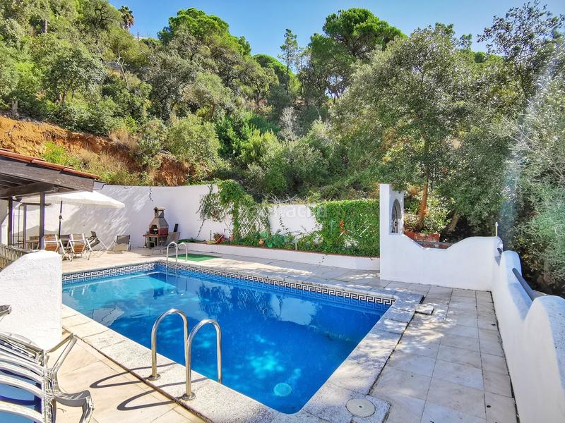 Foto 4d031506-c8b2-4838-bce3-4f20f25df50e. House with heating parking in Canyelles Lloret de Mar