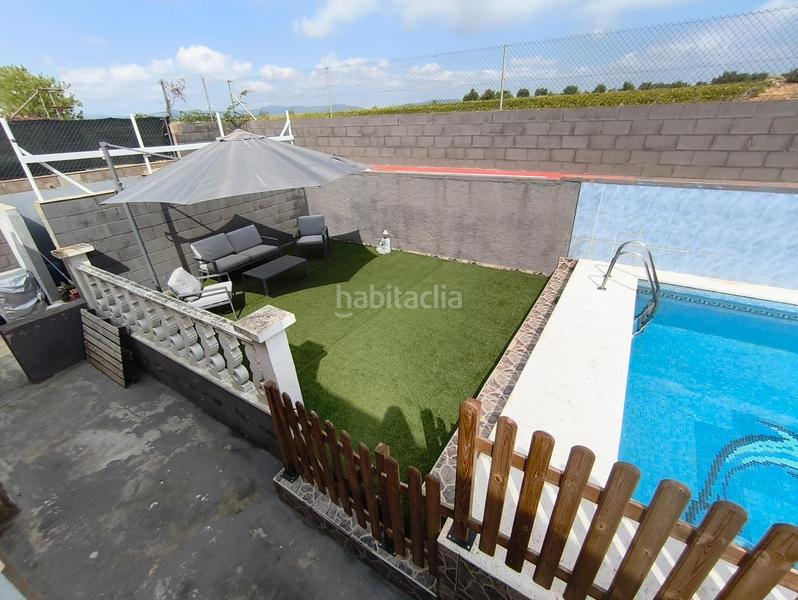 Foto 043d4a9d-ab01-480f-b2a5-d6f1693522ad. Chalet  en venta en urb lalzineta completamente reformada en Montferri