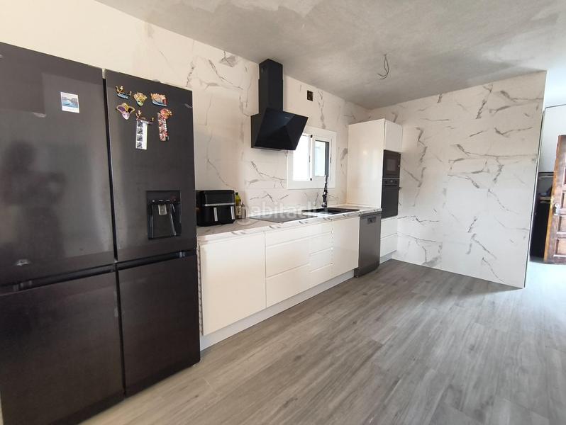 Foto 250e73ae-e4e4-422c-9c4b-5cb4fb036bb8. Chalet  en venta en urb lalzineta completamente reformada en Montferri