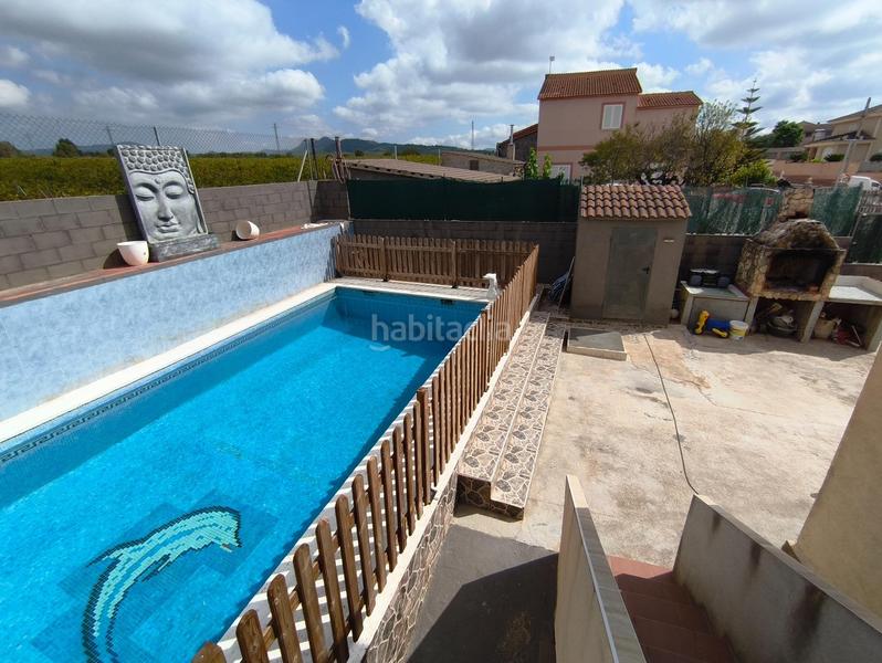 Foto 561d461f-8b21-4385-8dcb-694300c52a43. Chalet  en venta en urb lalzineta completamente reformada en Montferri