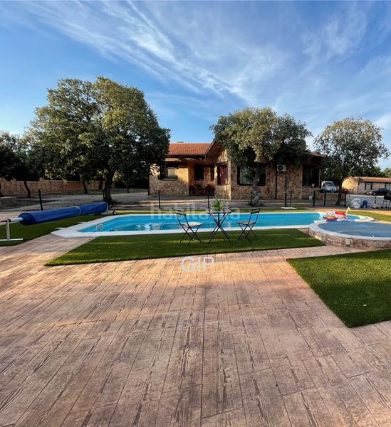 Foto 17e6d1ec-6cd8-49b0-8c35-946544f769ae. Casa amb calefacció aparcament piscina a Pioz