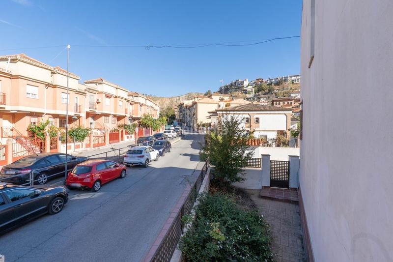 Foto 105dab2f-e10f-4cb1-9b6e-5f0884273880. Casa aparellada amb calefacció aparcament piscina a Granada