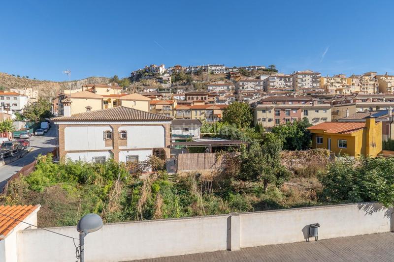 Foto 2a22e5ec-d114-4365-a1b9-82dd466ac9cc. Casa aparellada amb calefacció aparcament piscina a Granada