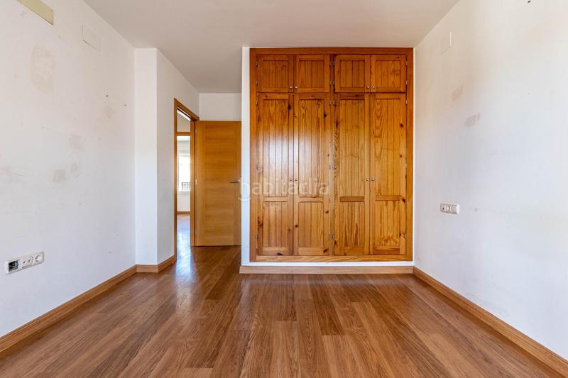 Foto 64b879e7-d3fc-4df9-a139-6736b8ac03e5. Casa aparellada amb calefacció aparcament piscina a Granada