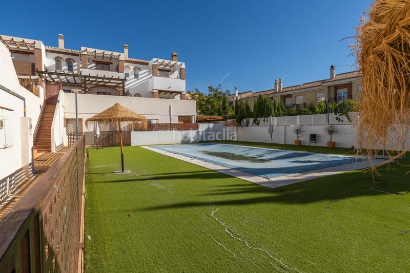 Foto 6d2f5ee5-191b-4863-abf8-c8780c23e1fd. Casa aparellada amb calefacció aparcament piscina a Granada