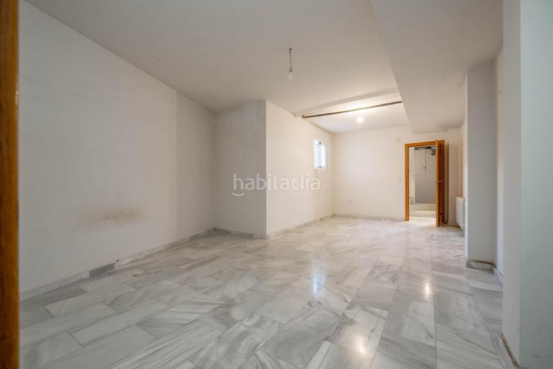 Foto 92fee11c-5f98-4be0-859b-48378167900c. Casa aparellada amb calefacció aparcament piscina a Granada