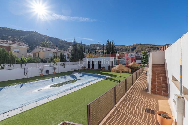 Foto a00dcc51-ea31-40ed-ad09-d6bde311b2b0. Casa aparellada amb calefacció aparcament piscina a Granada