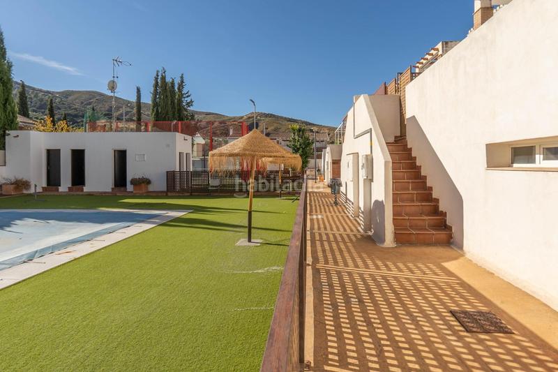 Foto b67f82af-1655-454e-98e9-6d9940064695. Casa aparellada amb calefacció aparcament piscina a Granada